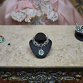 Load image into Gallery viewer, Sun Lemmens Emerald & Crystal Royal Necklace on Display Bust Netherlands
