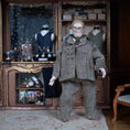 Load image into Gallery viewer, Porcelain Gentleman Doll in Grey Herringbone Wool Suit with Round Glasses & Green Cravat
