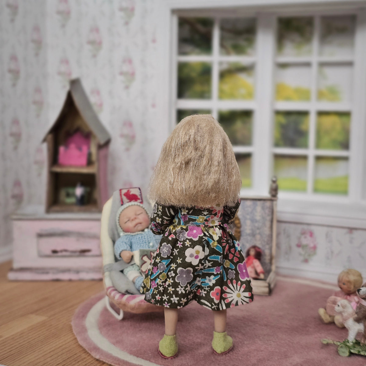 Catherine Muniere Blonde Little Girl Pointing Finger in Floral Dress 1:12 IGMA Fellow