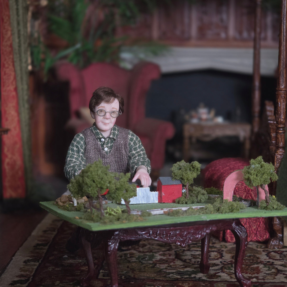 1:12 Scale Young Boy Playing with Train Set by Julie Campbell Miniature Vignette