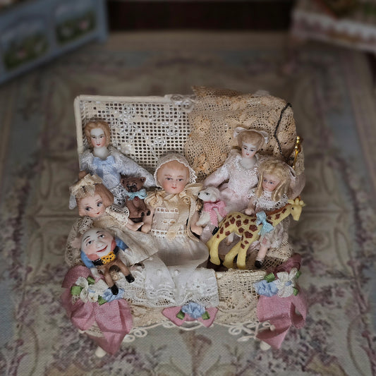 Pat Boldt Lace-Filled Wirework Toy Trunk with 6 Bisque Porcelain Dolls & Nursery Toys