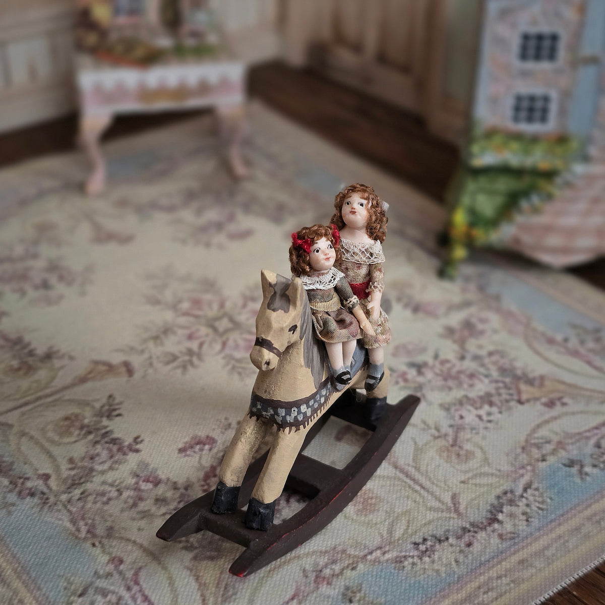 Almudena Gonzalez Two Victorian Little Girl Dolly's Riding a Wooden Rocking Horse