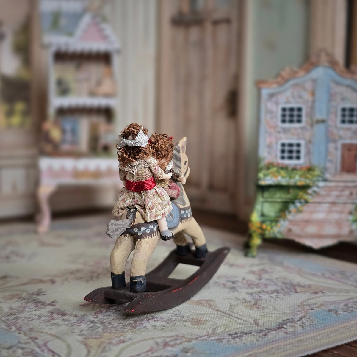 Almudena Gonzalez Two Victorian Little Girl Dolly's Riding a Wooden Rocking Horse