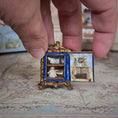 Load image into Gallery viewer, Signed Rococo Gilt Mantel Clock with Hidden Miniature Dollhouse Diorama
