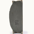 Load image into Gallery viewer, Dark gray painted underside with gold accents on a white background signed by Cristina Noriega Moran

