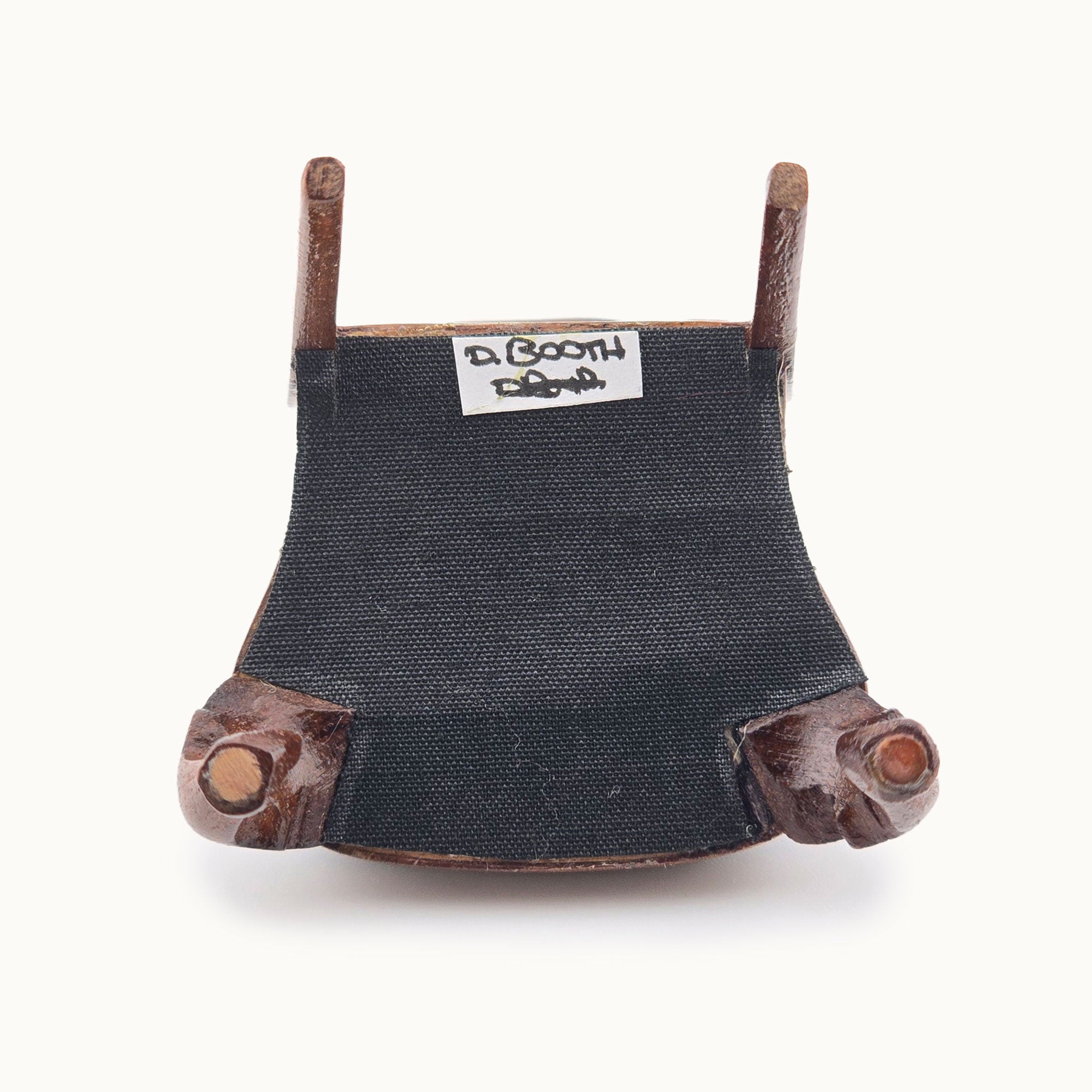 Underside of chair with signed label by David Booth