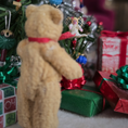 Load image into Gallery viewer, tiny angel tree topper for Christmas resting on a tree branch
