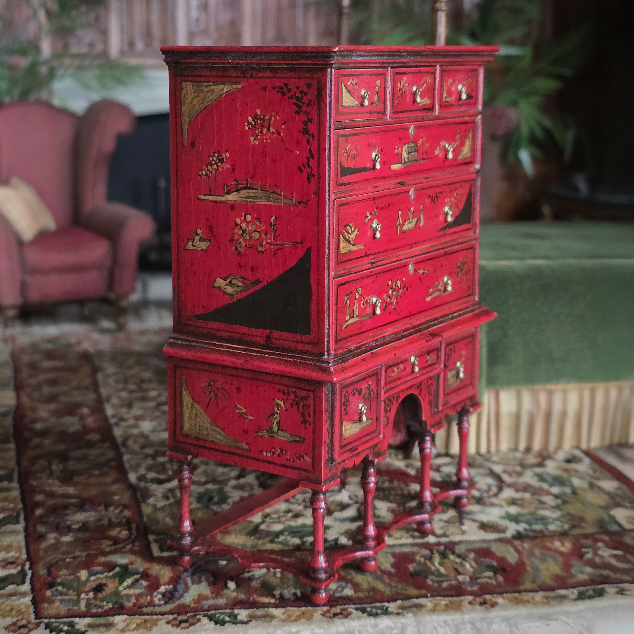 Red vintage cabinet with intricate designs in a room setting, Alan Barnes