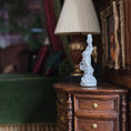 Load image into Gallery viewer, White statue on a wooden cabinet with a blurred background
