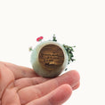 Load image into Gallery viewer, Signed underside of planter by Jeannie Lindquist
