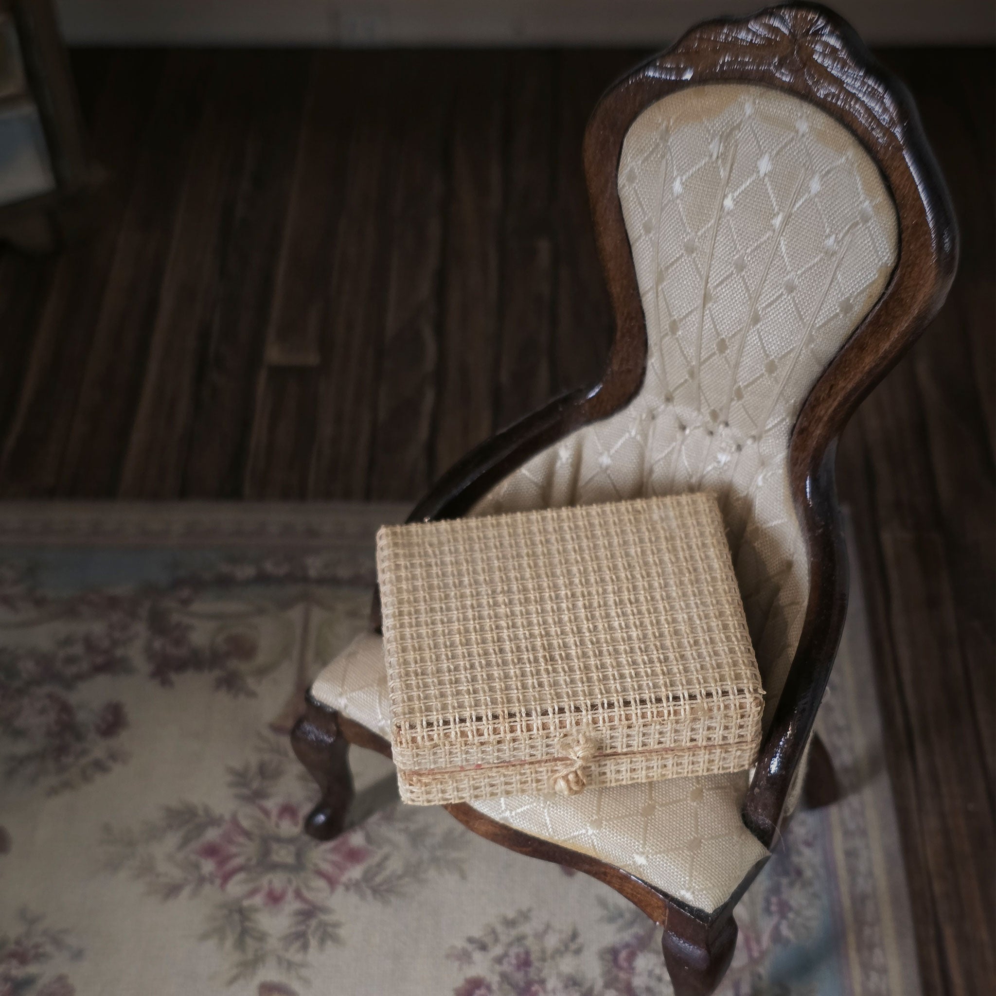 Vintage chair with a woven box on a patterned rug