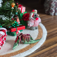 Load image into Gallery viewer, dollhouse miniature pair of green leather elf shoes with a tree and presents.

