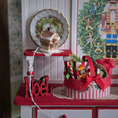 Load image into Gallery viewer, Dollhouse Miniature Light-Up English Cottage, on a festive shelf
