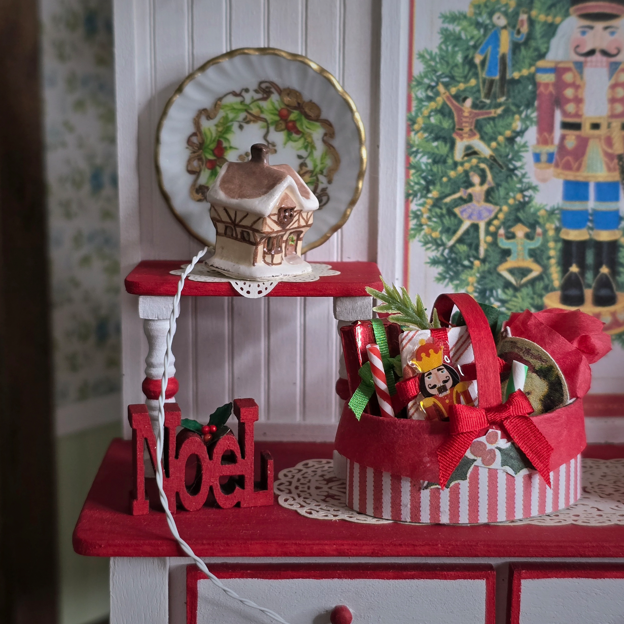 Dollhouse Miniature Light-Up English Cottage, on a festive shelf