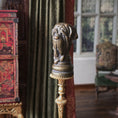 Load image into Gallery viewer, Decorative gold拄杖 with a dog head finial in an elegant room setting.
