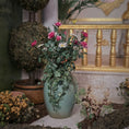 Load image into Gallery viewer, Floor planter with flowers in a decorative setting with gold elements
