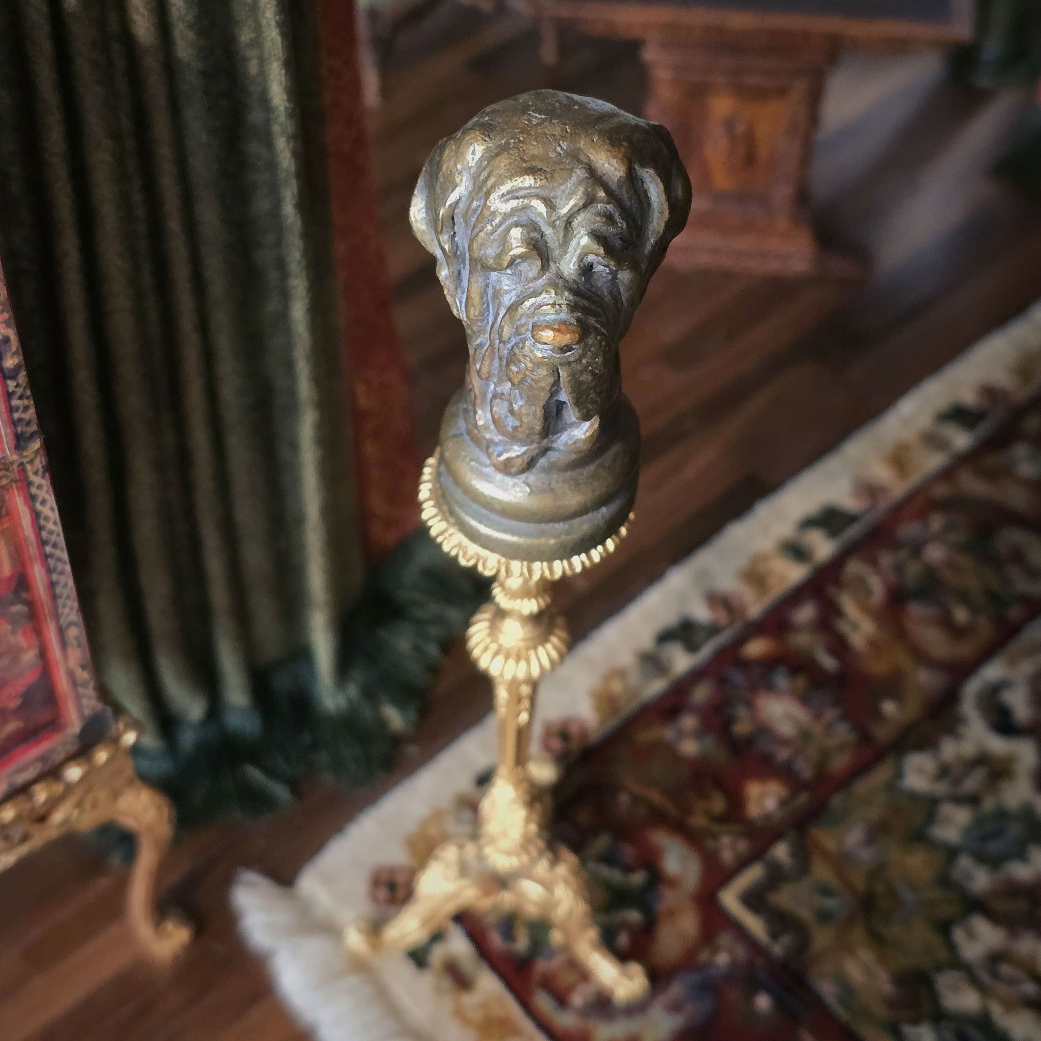 Decorative object with a classical design on a patterned rug