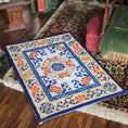 Load image into Gallery viewer, Decorative rug with floral patterns on a wooden floor
