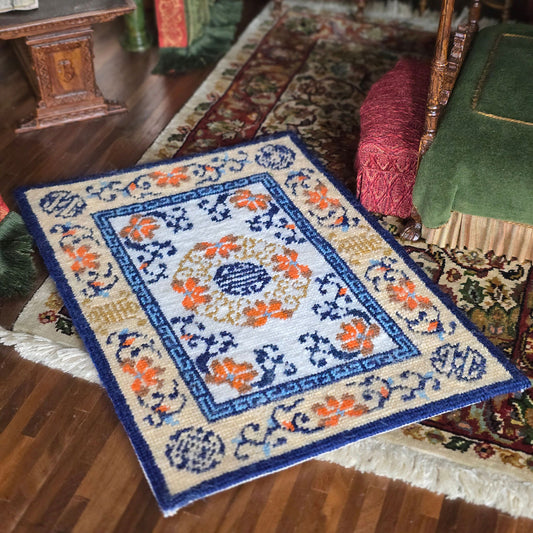 Decorative rug with floral patterns on a wooden floor
