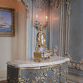 Load image into Gallery viewer, Decorative clock on a ornate table with a classical interior setting
