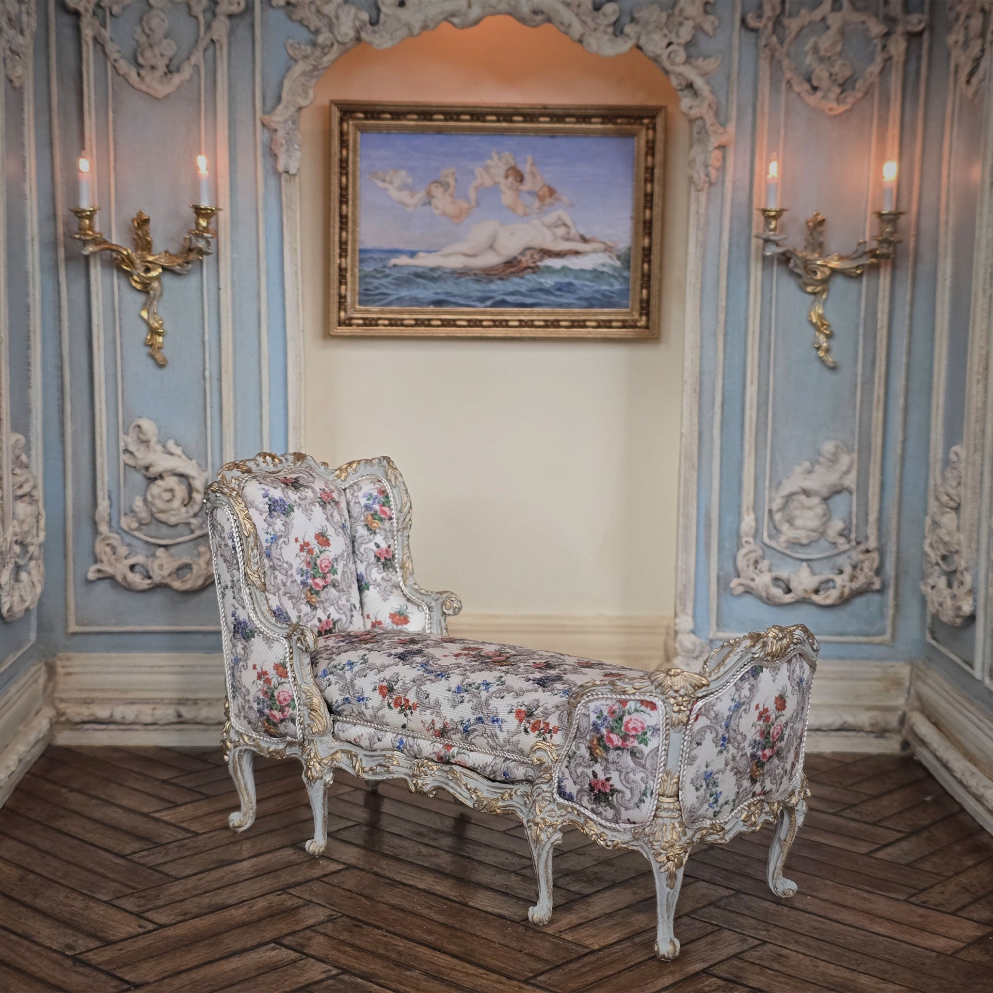 Decorative dollhouse interior with ornate furniture, wall sconces, and a painting.