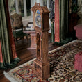 Load image into Gallery viewer, Wooden grandfather clock in a room with patterned rug and curtains
