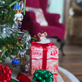 Load image into Gallery viewer, tiny angel tree topper for Christmas on top of a gift
