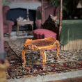 Load image into Gallery viewer, Decorative wooden table on a patterned rug with a blurred background
