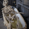 Load image into Gallery viewer, Clay Halloween Clawfoot Bathtub OOAK Miniature with Skeleton, Skulls & Candles

