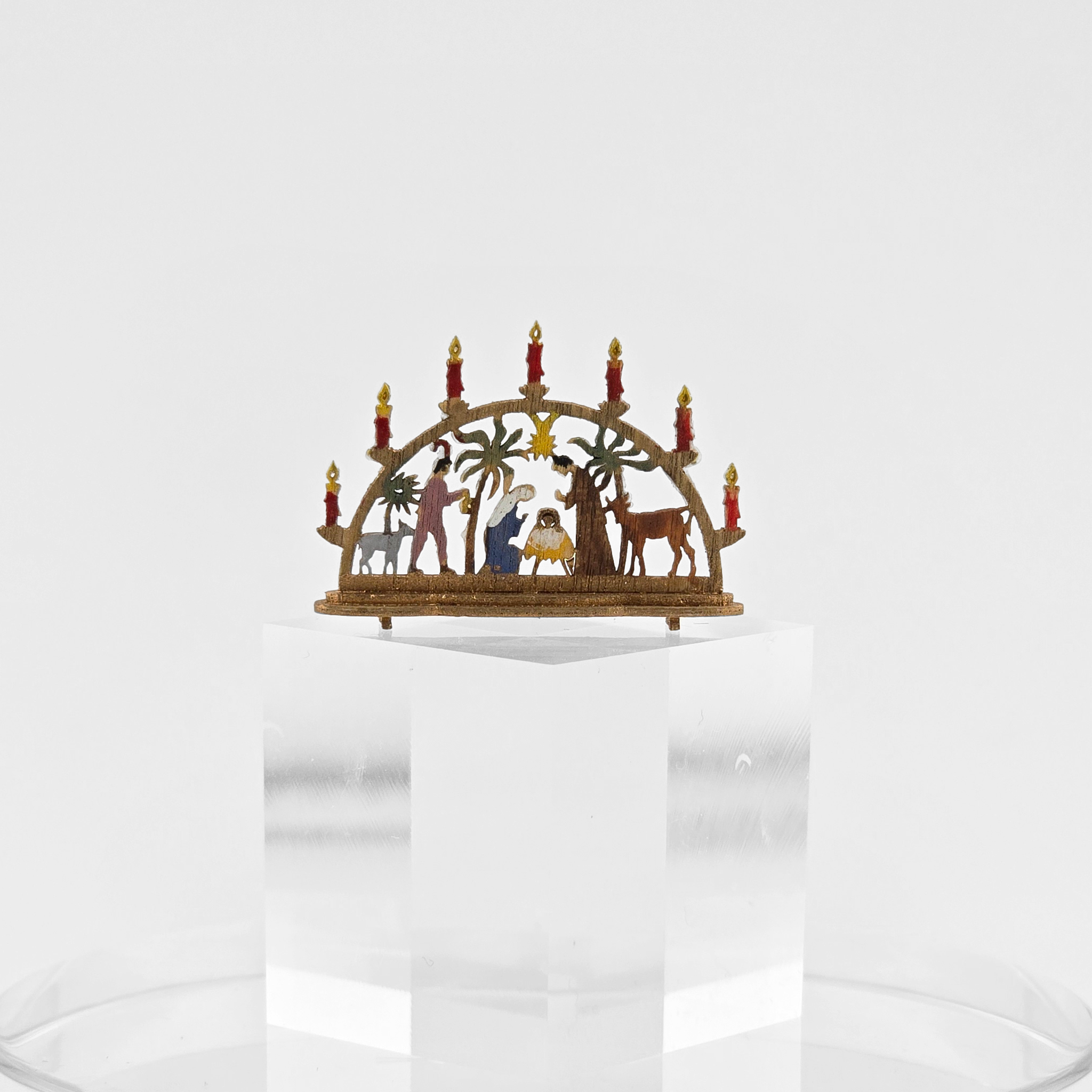 Miniature Schwibbogen Nativity Scene – Hand-Carved Wood on a white background