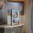 Load image into Gallery viewer, Decorative clock with artistic design on a marble surface
