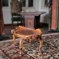 Load image into Gallery viewer, Decorative wooden table with intricate carvings on a patterned rug
