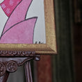 Load image into Gallery viewer, Close-up of a wooden stand with framed illustration on it. Alexandra R.
