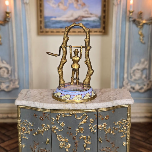 Decorative miniature children's toy with crank