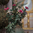 Load image into Gallery viewer, Decorative floral arrangement in a planter pot with a blurred indoor background
