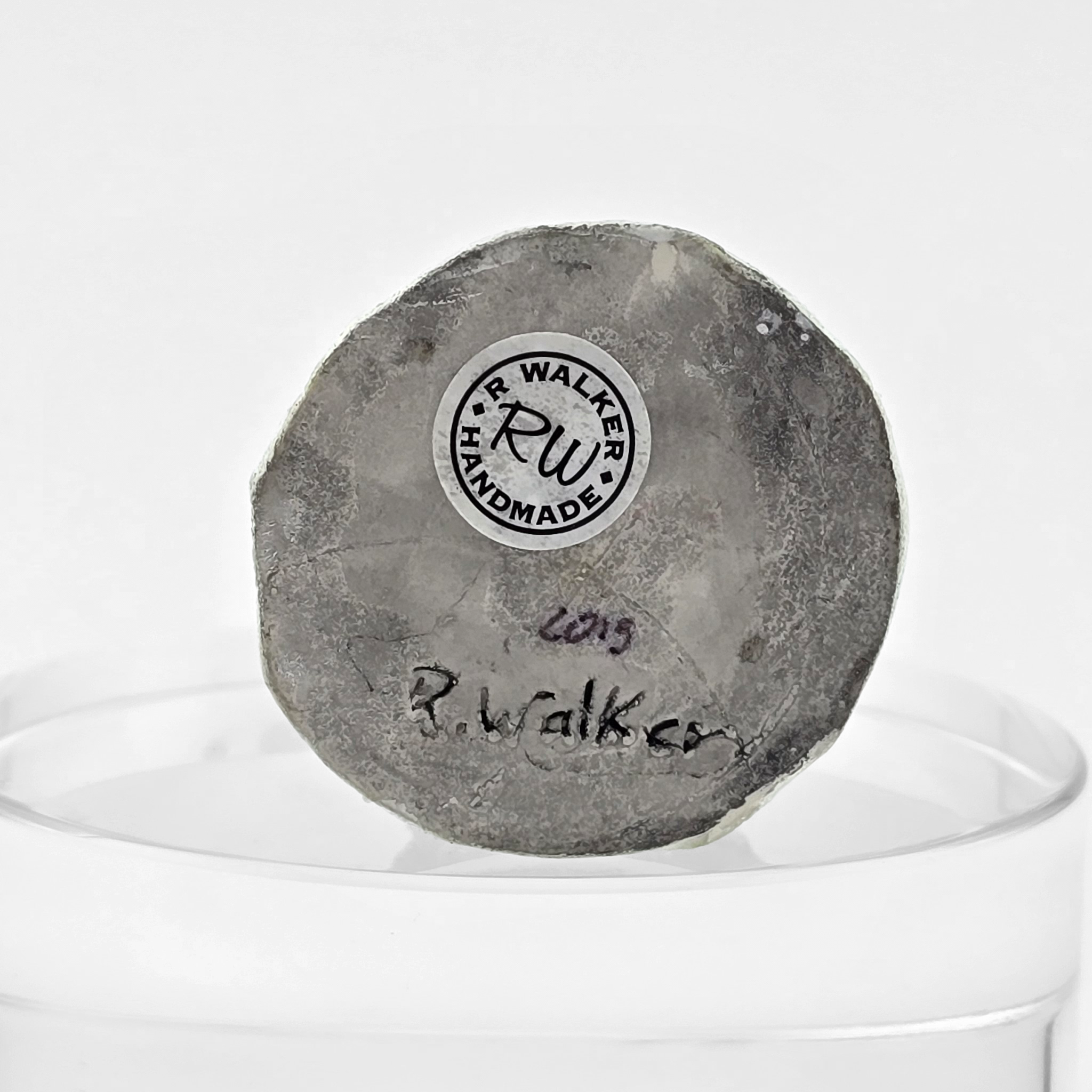 Signed underside with 'R. Walker Handmade' label on a white background
