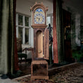 Load image into Gallery viewer, Wooden grandfather clock in a room with decorative elements
