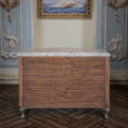 Load image into Gallery viewer, Wooden back of buffet in a decorative room with ornate walls and a painting.

