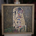 Load image into Gallery viewer, Framed painting of a couple embracing, inspired by Gustav Klimt's style.
