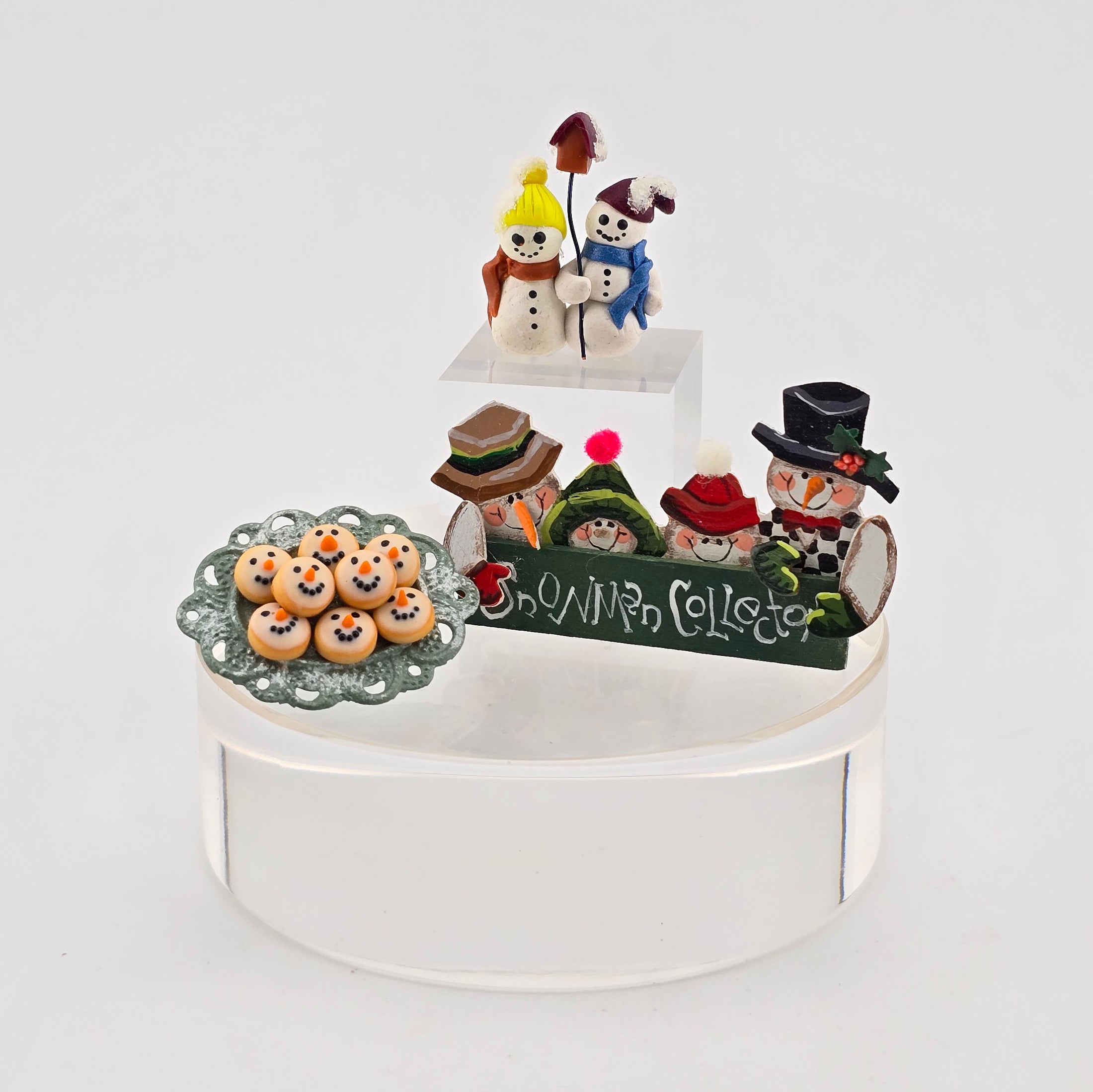 miniature dollhouse snowmen-themed sign, shelf sitter and cookie platter