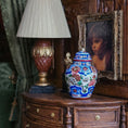 Load image into Gallery viewer, Decorative table with a lamp, vase, and framed portrait on an ornate wooden surface.
