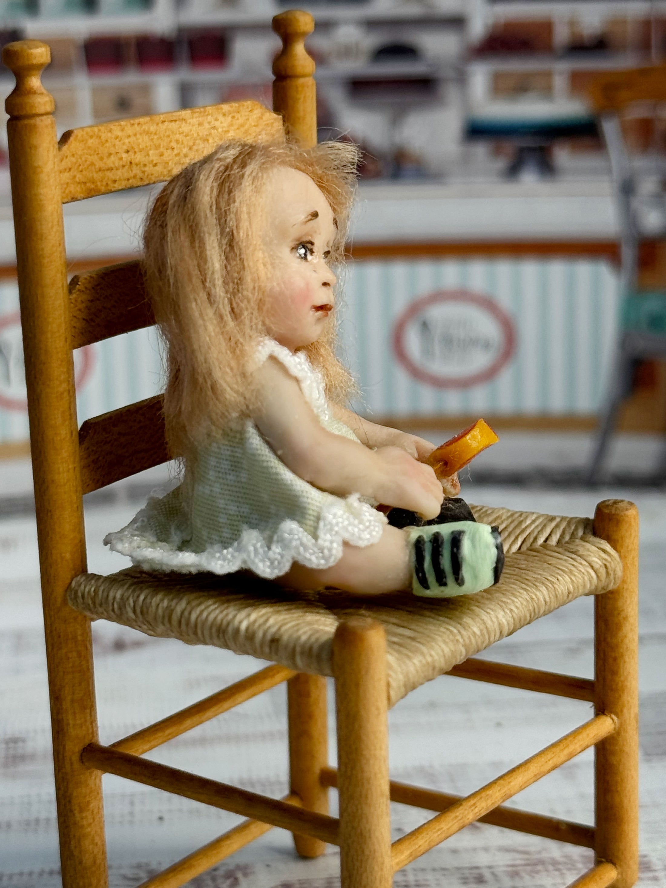 Sculpted Blonde Seated Young Girl Toddler Doll w Lollipop, right side