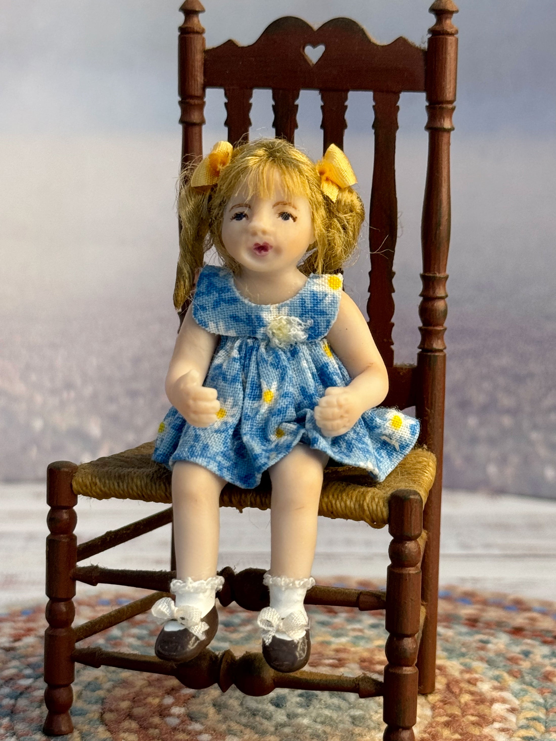 Bonnie Justice Sculpted Seated Little Blonde Girl Doll in Blue Dress, in chair