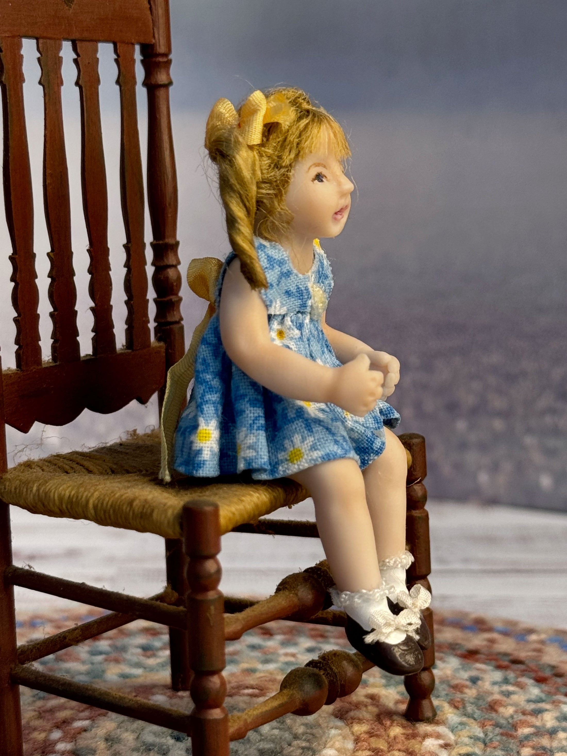 Bonnie Justice Sculpted Seated Little Blonde Girl Doll in Blue Dress, right side