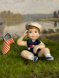 Load image into Gallery viewer, Saluting Patriotic Seated Little Boy Toddler Doll w Flag, front
