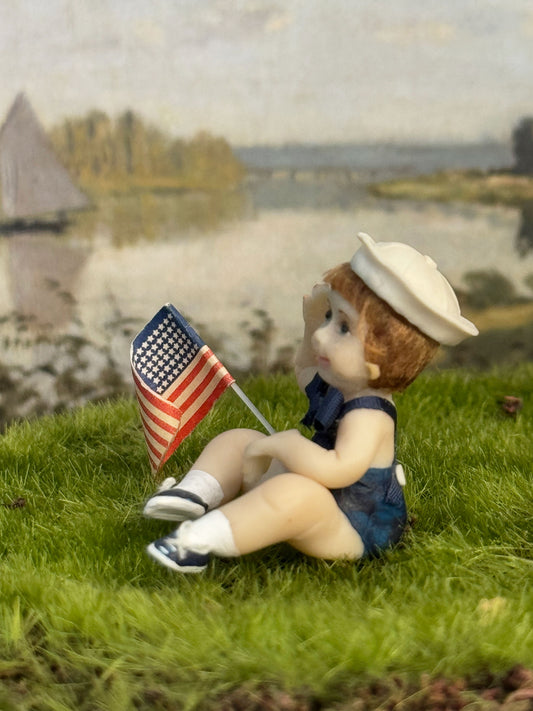 Saluting Patriotic Seated Little Boy Toddler Doll w Flag, left side