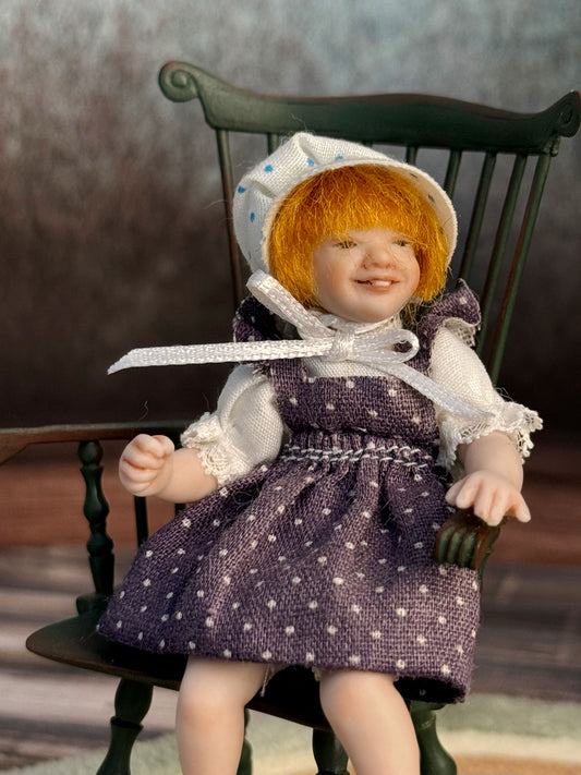 Sculpted Porcelain Red Head Primitive Young Girl Doll, Jointed, seated in a Windsor chair