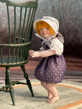 Load image into Gallery viewer, Sculpted Porcelain Red Head Primitive Young Girl Doll, Jointed, left side, zoomed out

