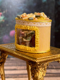 Load image into Gallery viewer, Miniature Dollhouse Yellow Silk Victorian Hatbox with Diorama Hat Shop Scene Inside, side
