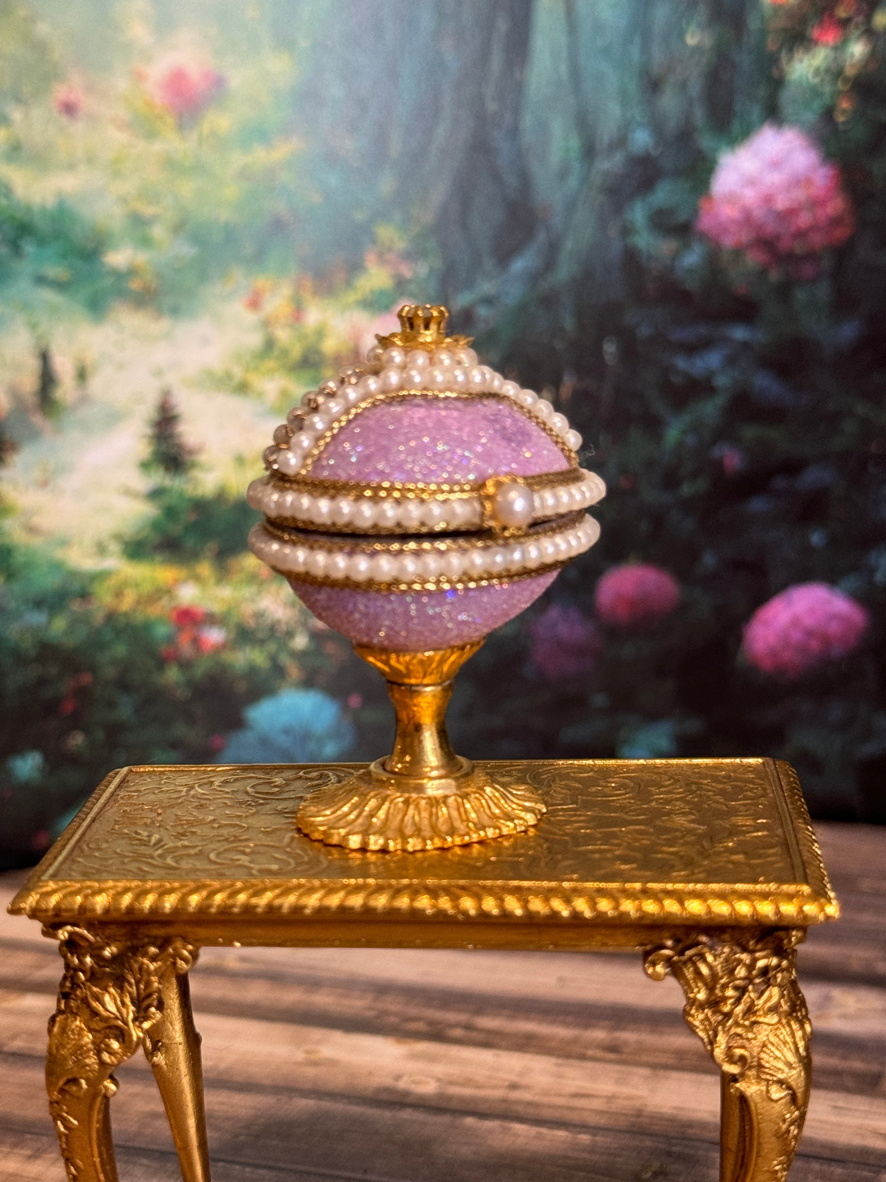 Artisan Signed, 'Hiller' sculpted vintage miniature baby in glittered footed pink egg stand, closed view